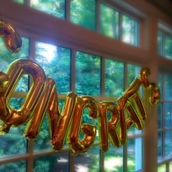 golden-balloons-with-the-word-congrats-at-a-graduation-party-.jpg